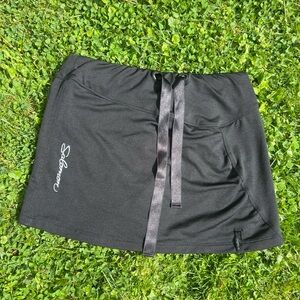 Salomon black mini sportswear skirt with built in shorts size small